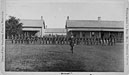 soldiers present arms at Fort Pembina, DT