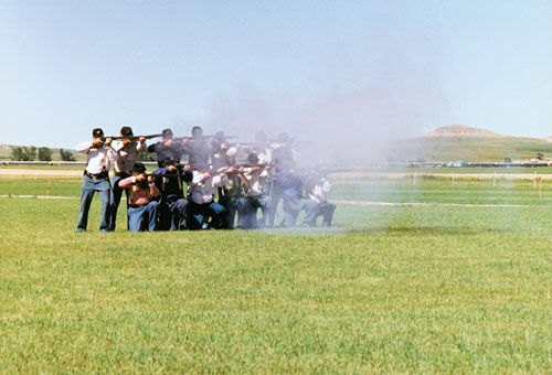 Reenactor Soldiers firing rifles