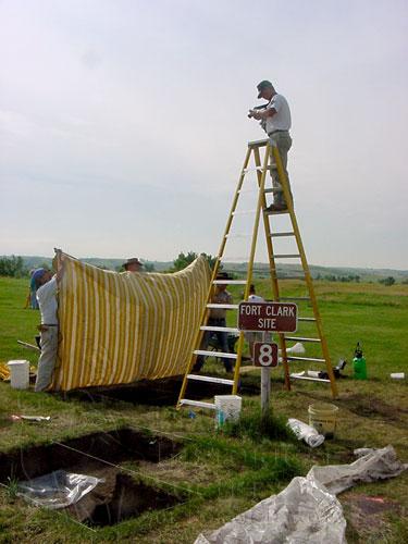 Taking photos of excavation units