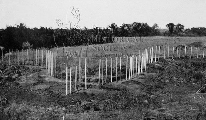 early archaeology marking fortification ditch with stakes