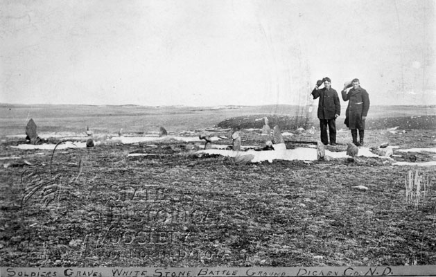 Saluting soldiers graves at Whitestone Hill