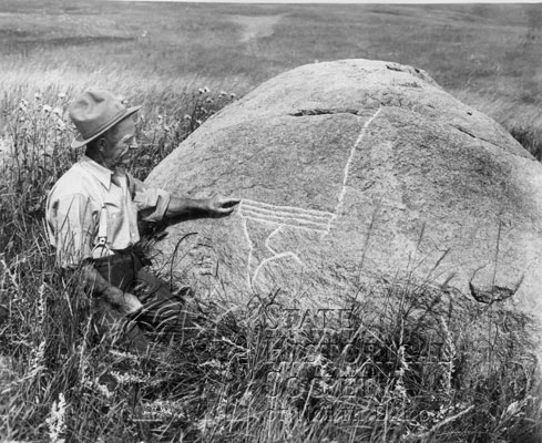 markings on boulder near whitestone hill battlefield